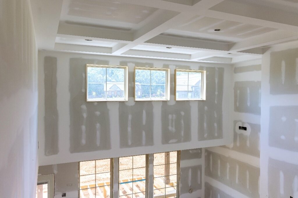 inside of residential construction project featuring side overhang windows