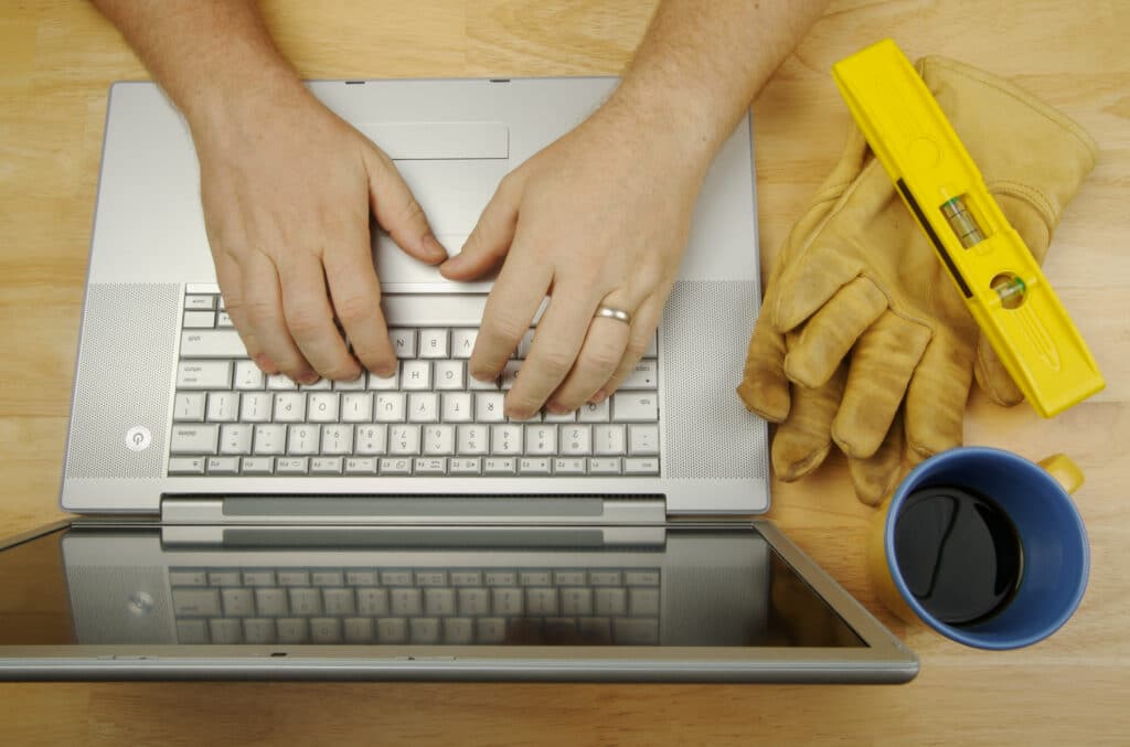 contractor looking at computer