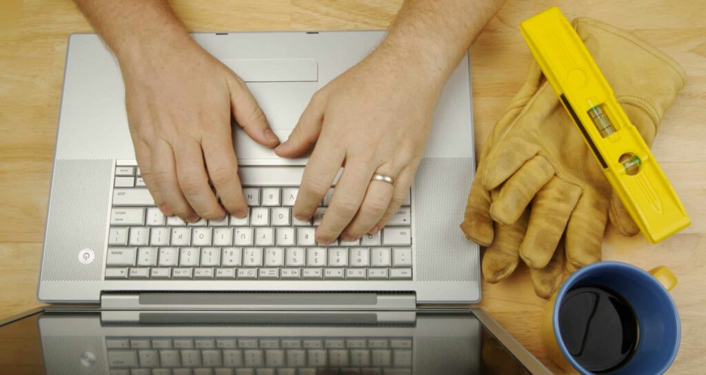 contractor working on computer