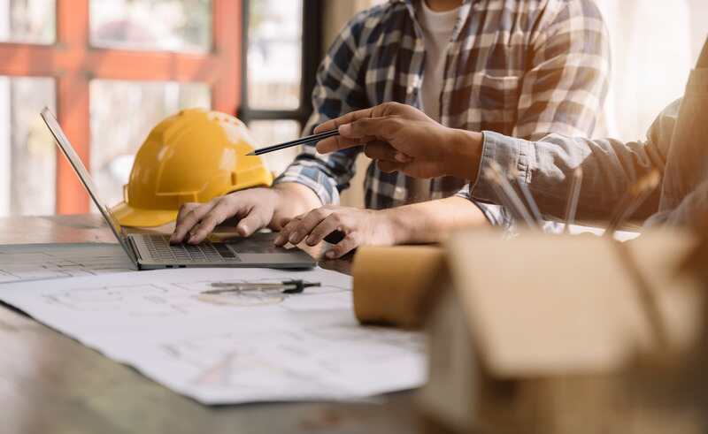 Team architect or engineer in office working on architects project