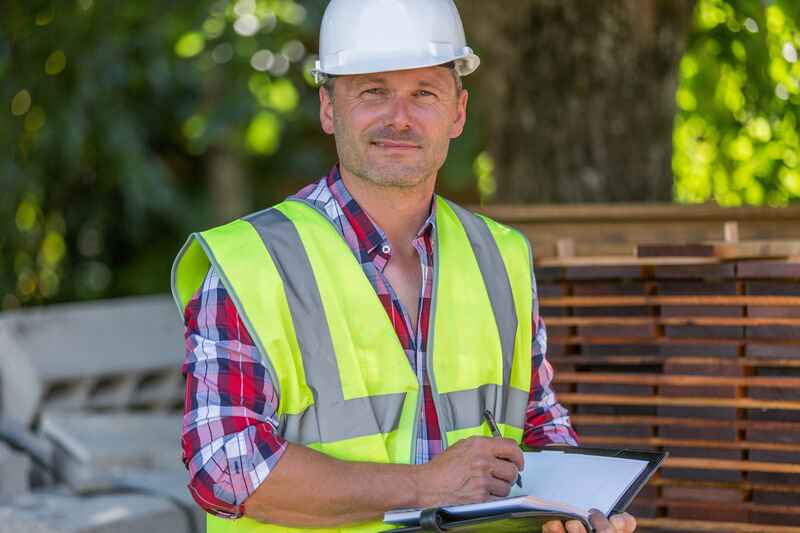 Contractor taking notes