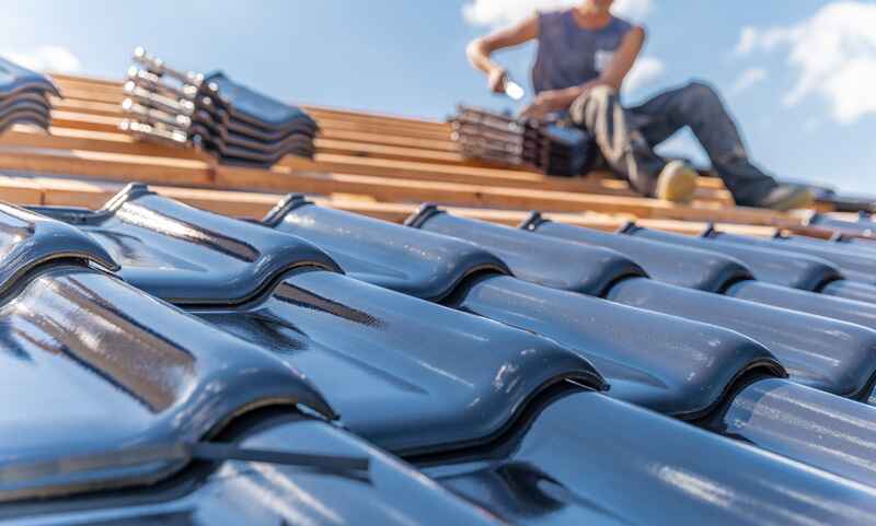 production of roofs from ceramic fired tiles on a house