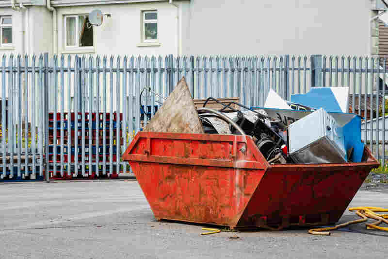 Old dumpster full of junk