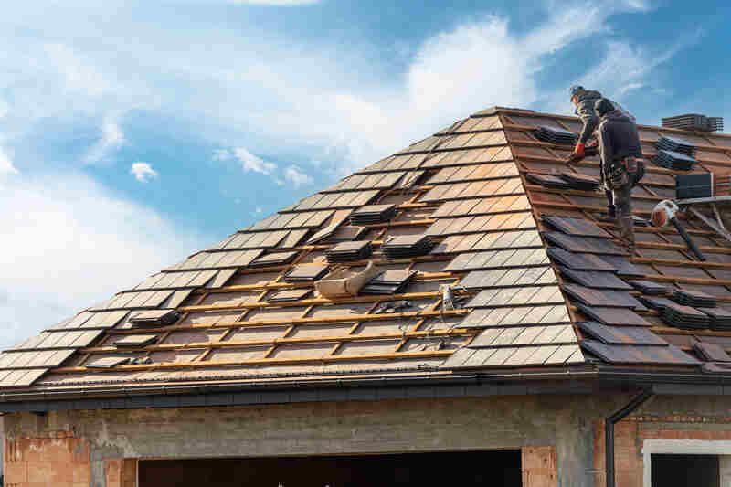 builder working on rooftop