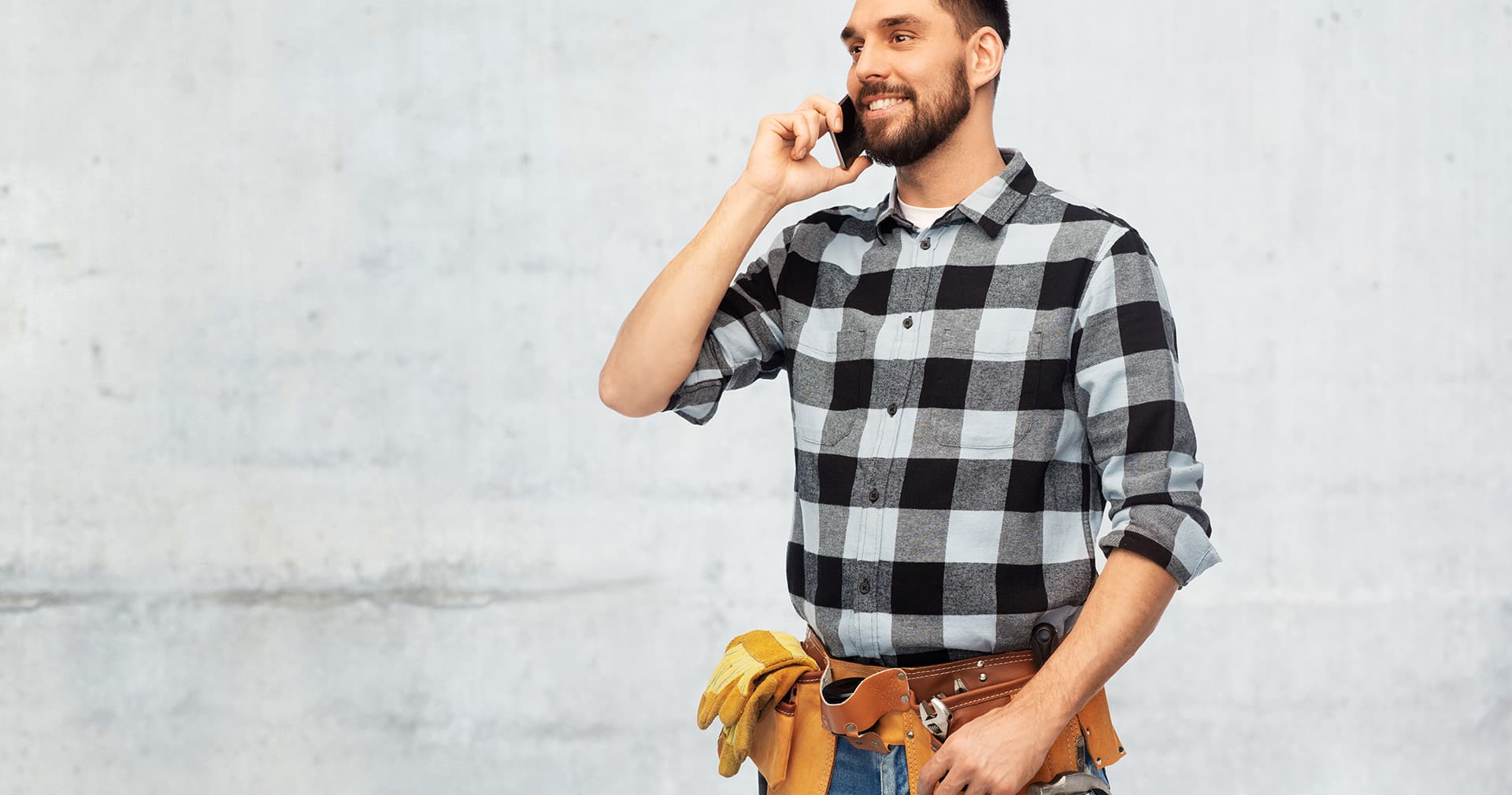Contractor takes a call with a client