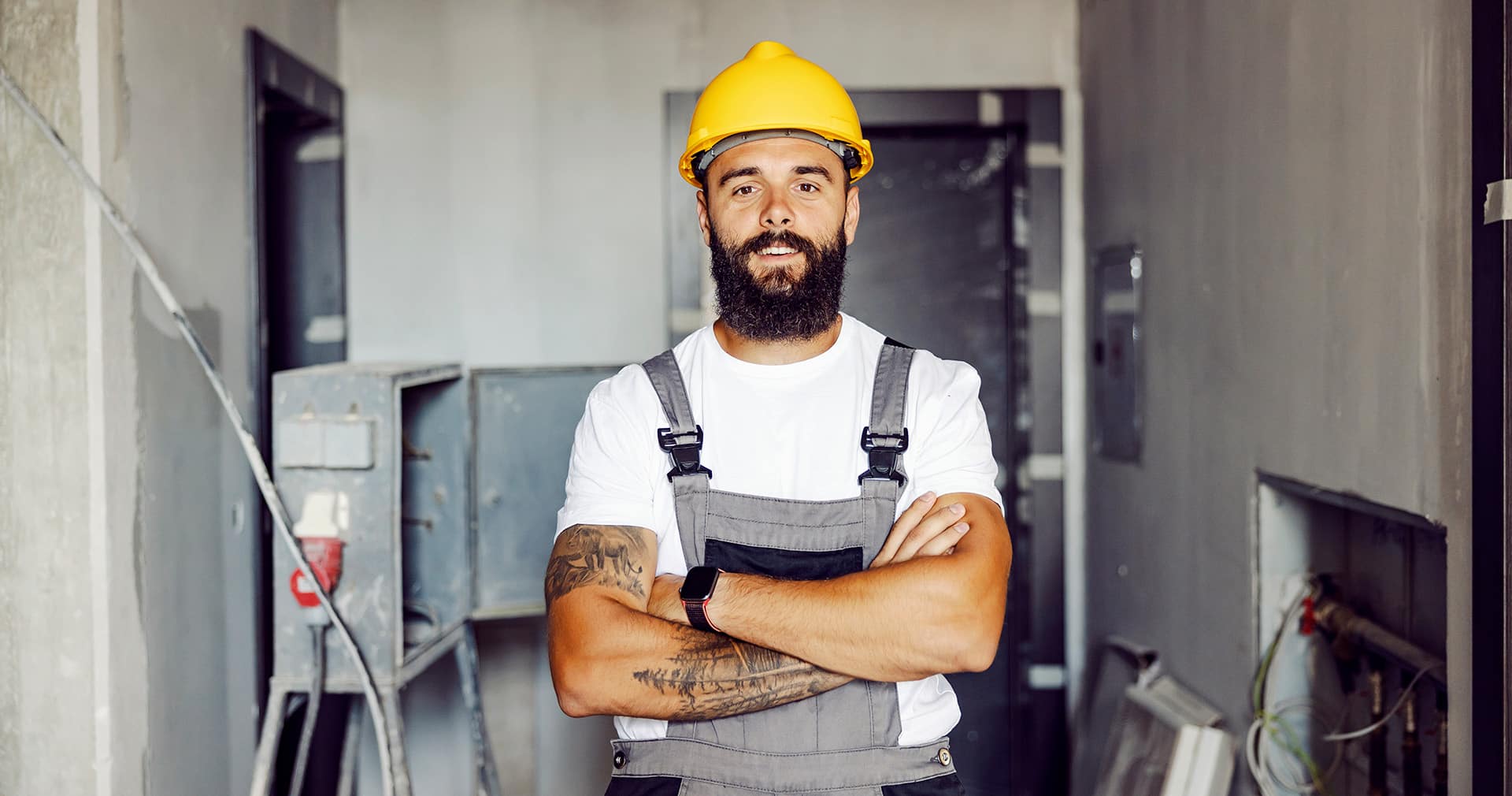 Electrical contractor in hard hat onsite