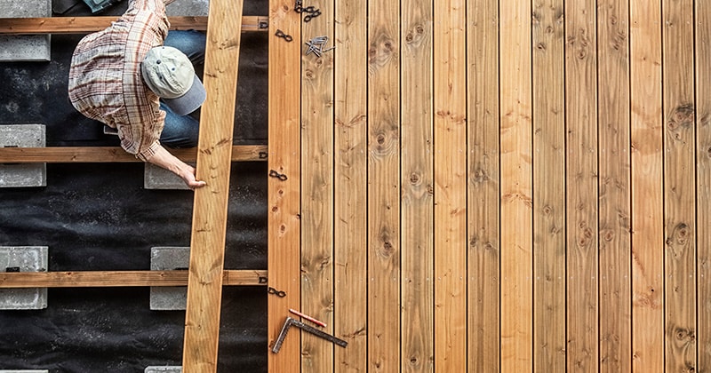 Aerial view of home pro constructing wooden deck