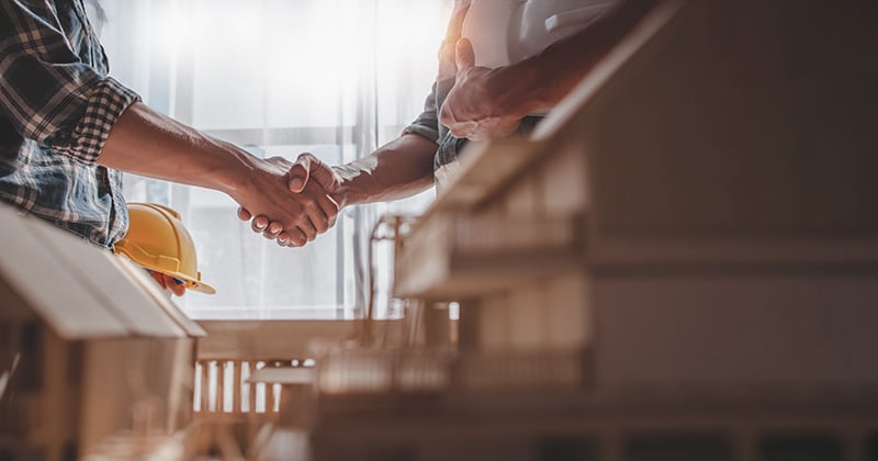 Contractors shaking hands
