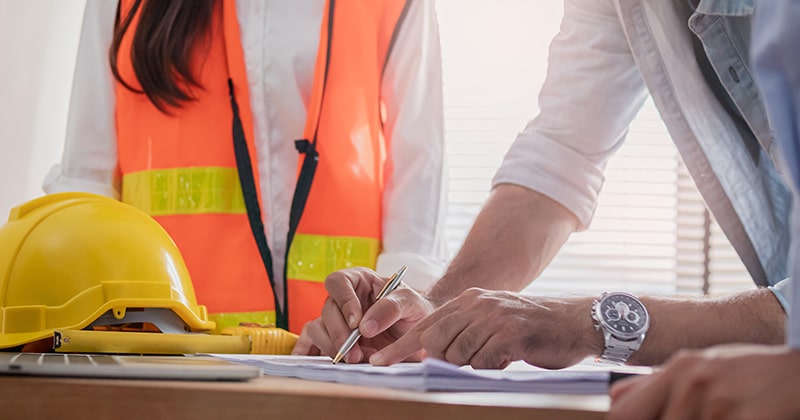 Contractors working in office