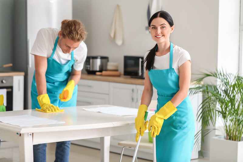 Team of janitors providing cleaning services