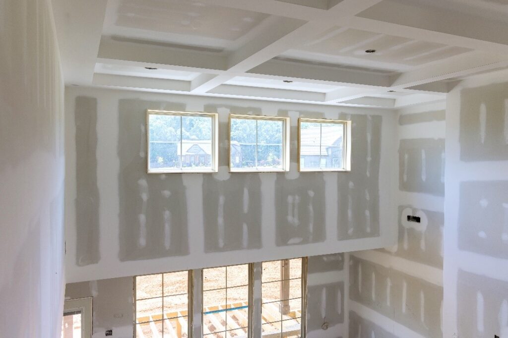 inside of residential construction project featuring side overhang windows